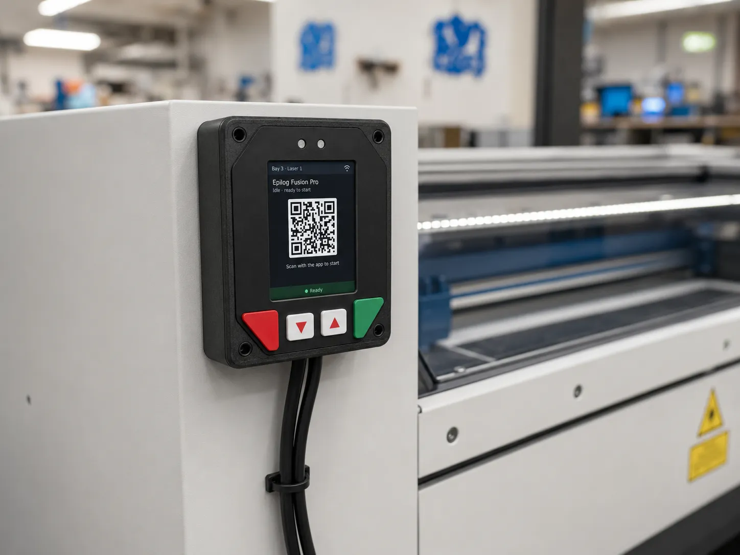MakerOps controller mounted beside a laser cutter, its display showing 'Epilog Fusion Pro — Idle, ready to start' with a session QR code
